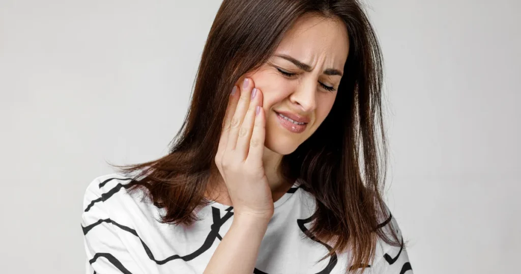 Woman-Tooth-Pain-Dental-Emergency